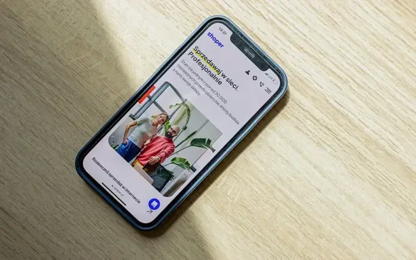 A phone showing an online store