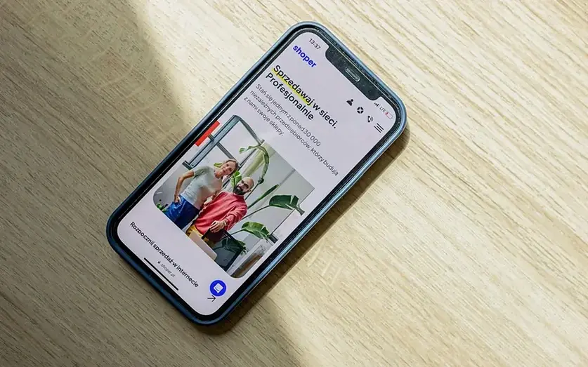 A phone showing an online store