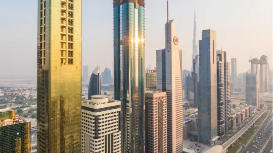 The Dubai skyline along Sheikh Zayed Road, with the Burj Khalifa in the distance